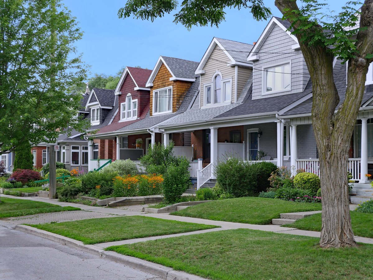 Residential street with small semi-detached houses in a Wisconsin neighborhood