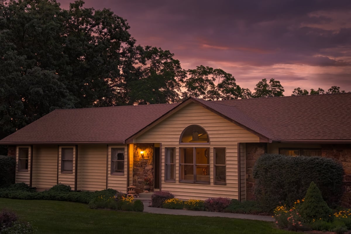 Suburban Maryland home at twilight in summer